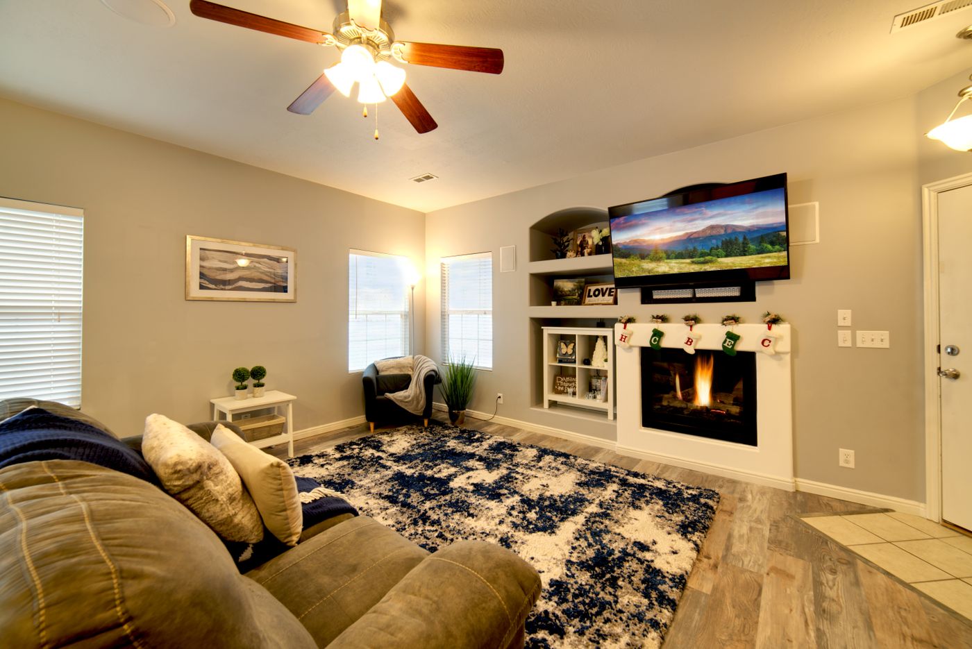 A gas log set burning in the fireplace of a Portland-area living room
